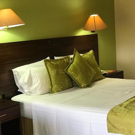 Casa Morales Hotel Internacional Y Centro De Convenciones Ibagué Eksteriør bilde A bedroom at the hotel